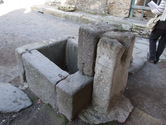 Altar at I.10.1, Pompeii. Old undated photograph. A wall blocked the Vicolo di Paquius Proculus, centre.