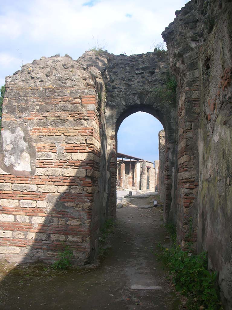 Porta Ercolano or Herculaneum Gate, Pompeii. May 2010. 
Looking south towards Via Consolare through west side of gate at south end. Photo courtesy of Ivo van der Graaff.
