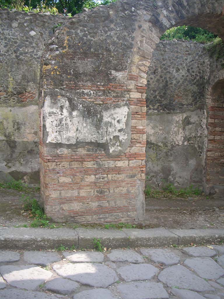 Porta Ercolano or Herculaneum Gate, Pompeii. May 2010. 
Looking towards central pilaster of west side of gate. Photo courtesy of Ivo van der Graaff.
