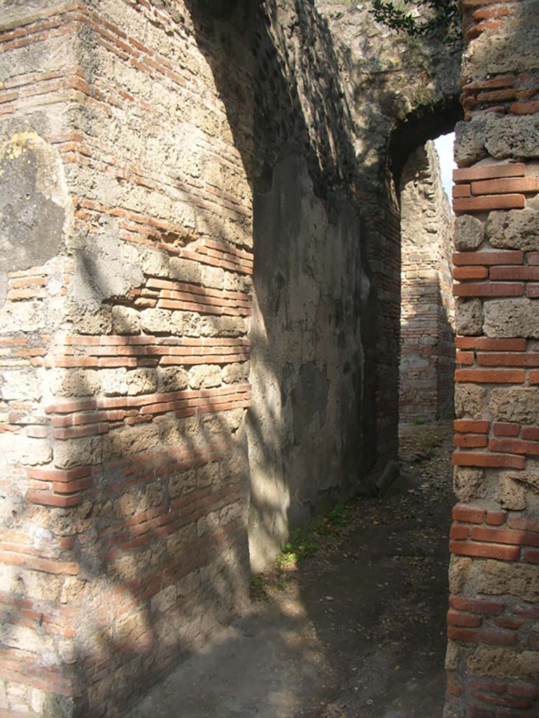Porta Ercolano or Herculaneum Gate, Pompeii. May 2010. 
Looking south towards east wall from north end of west side of gate. Photo courtesy of Ivo van der Graaff.
