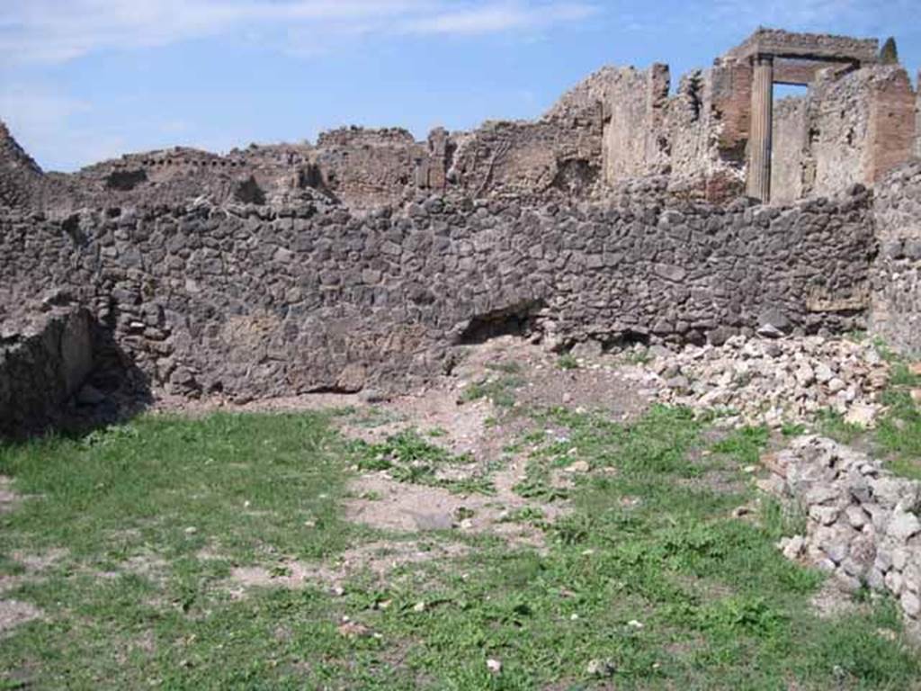 I.1.8 Pompeii. September 2010. North wall and north-west corner of yard. Photo courtesy of Drew Baker. Originally this would have been the site of other rooms.  These were bombed in 1943, destroying the internal walls and part of the north perimeter wall.  See Garcia y Garcia, L., 2006. Danni di guerra a Pompei. Rome: L’Erma di Bretschneider. (p.37)
