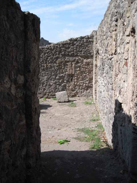 1.1.10 Pompeii. September 2010. East end of insula of I.1, with street altar on its corner. Looking north along unnamed vicolo between I.1 and I.5.
Photo courtesy of Drew Baker.