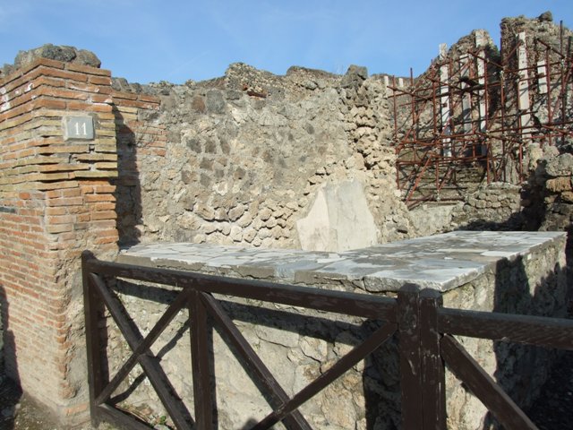 I.2.11 Pompeii. December 2007. Looking east to small rear room.