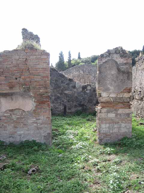 I.2.15 Pompeii. September 2010. West wall of room in south-west corner of atrium. Photo courtesy of Drew Baker.