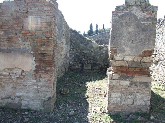I.2.15 Pompeii. September 2010. East wall with doorway to south-west corner of atrium. Photo courtesy of Drew Baker.