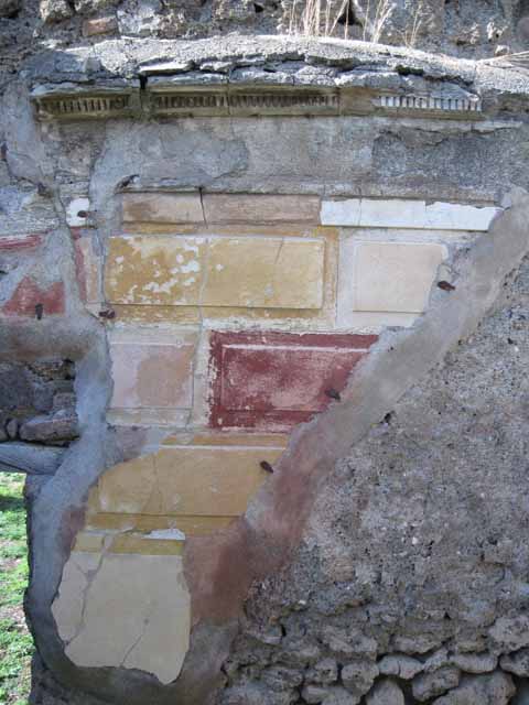 1.2.16 Pompeii. September 2010. Room 5, north-east corner, with detail of remaining first style decoration. Photo courtesy of Drew Baker.
