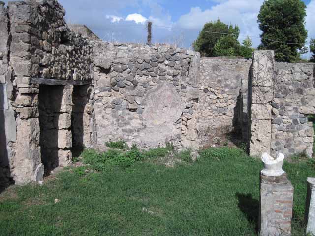 I.2.17 Pompeii. March 2009. Room 3, east wall with site of latrine and downpipe in north-east corner. 