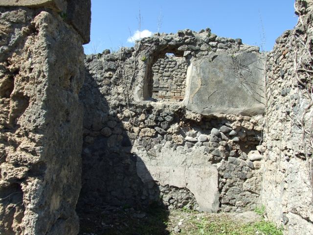 I.2.17 Pompeii. September 2010. Room 6, upper south wall with detail of window. Photo courtesy of Drew Baker.