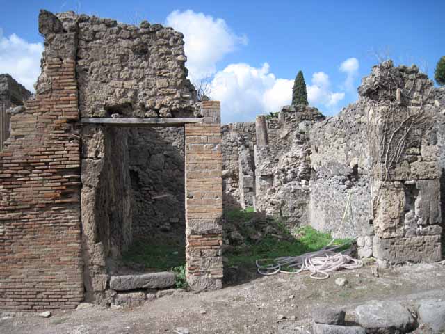 I.2.26 and I.2.25 Pompeii. December 2006. Entrance to steps to upper floor (on left).