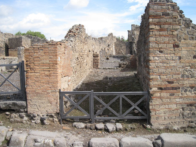 I.3.8a Pompeii. September 2010. Looking south towards entrance doorway with steps to I.3.8a. Photo courtesy of Drew Baker.