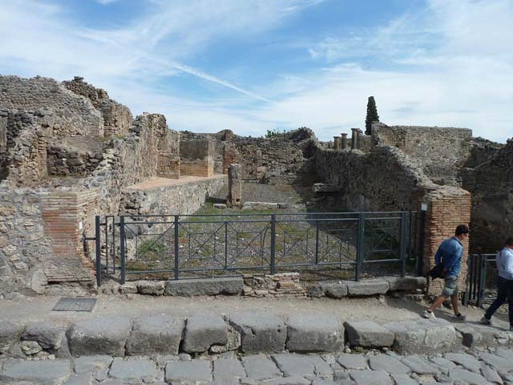 I.3.10 Pompeii, on left. September 2015. Two linked doorways on east side of Via Stabiana.  I.3.9 shop, on right. 