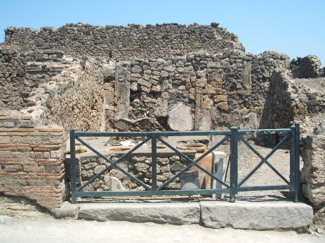 I.3.11 Pompeii. December 2007. Counter with the remaining three of the eight dolia.