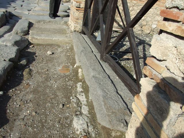 I.3.12 Pompeii. September 2010. Looking west across the shop towards the entrance doorway onto the Via Stabiana. Photo courtesy of Drew Baker.