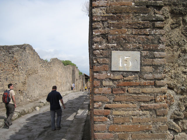 I.3.13 Pompeii. December 2007.  East wall looking south along corridor to narrow area behind which is shared with I.3.14.

