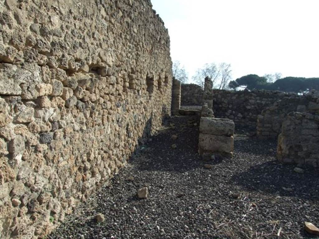 I.3.13 Pompeii. December 2007.  East wall looking south along corridor to narrow area behind which is shared with I.3.14.
