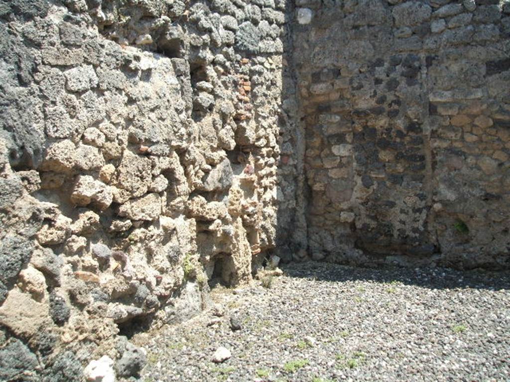 I.3.18 Pompeii. May 2005. South-east corner, showing two doorways blocked in antiquity.