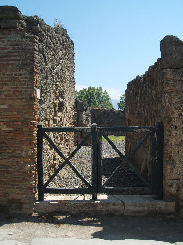 I.3.20 Pompeii. September 2010. Looking south along fauces towards atrium, from entrance doorway. Photo courtesy of Drew Baker.