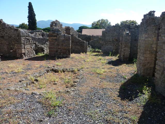 I.3.23 Pompeii. December 2006. Looking over wall into room to north of peristyle, from I.3.22