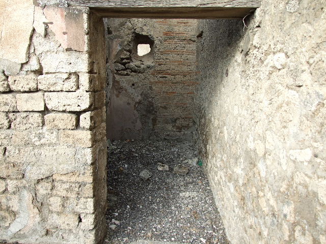 I.3.24 Pompeii. December 2006. Looking through oecus to tablinum and atrium, towards entrance.