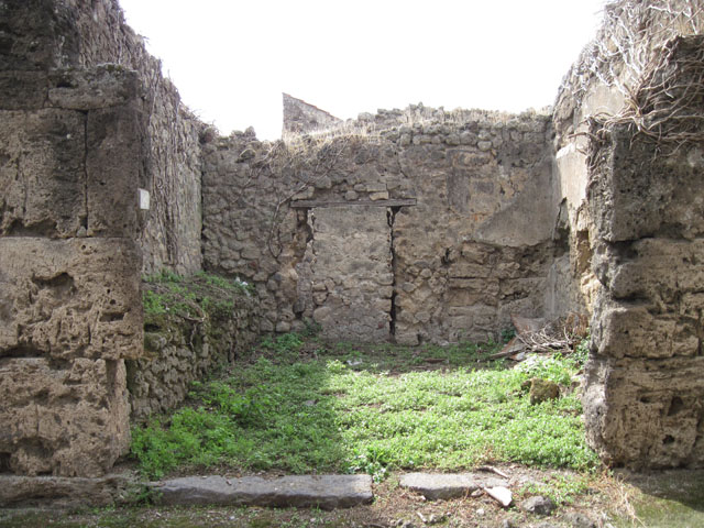 I.3.26 Pompeii. September 2010. ID number plate on south side of entrance doorway. Photo courtesy of Drew Baker.

