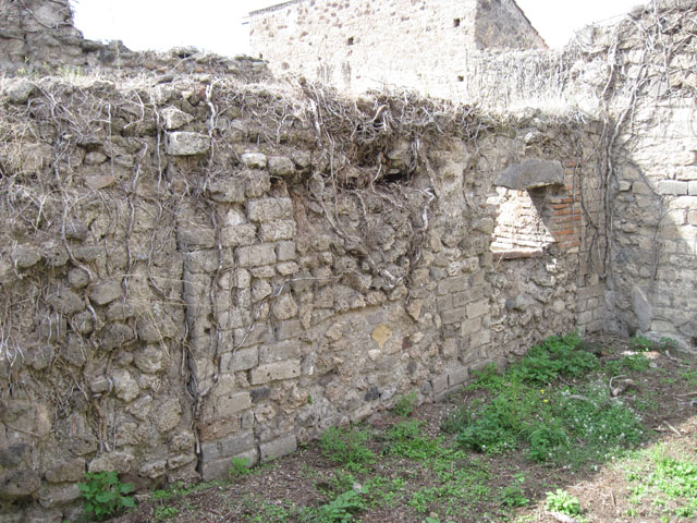 I.3.27 Pompeii. September 2010. Looking towards doorway in south wall of bakery room. Photo courtesy of Drew Baker.
