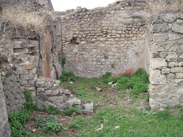 I.3.29 Pompeii. March 2009. Looking north into small room with stairs to upper floor at the far end. Entrance to Room 3, on the right hand side.