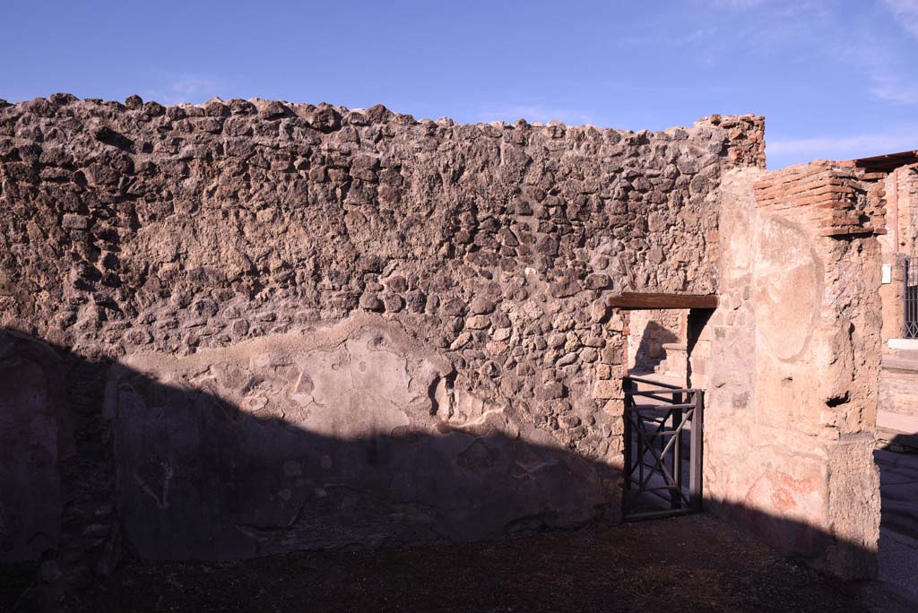 I.4.23 Pompeii. October 2019. Looking towards west wall of shop-room, with doorway into entrance corridor of I.4.22. 
Foto Tobias Busen, ERC Grant 681269 DCOR.

