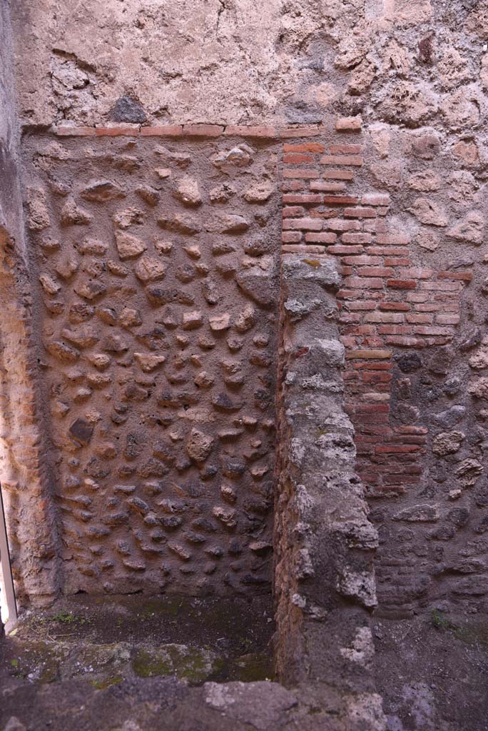 I.4.26 Pompeii. October 2019. 
North wall of small room, with blocked doorway to steps, on west side of I.4.25.
Foto Tobias Busen, ERC Grant 681269 DCOR.
