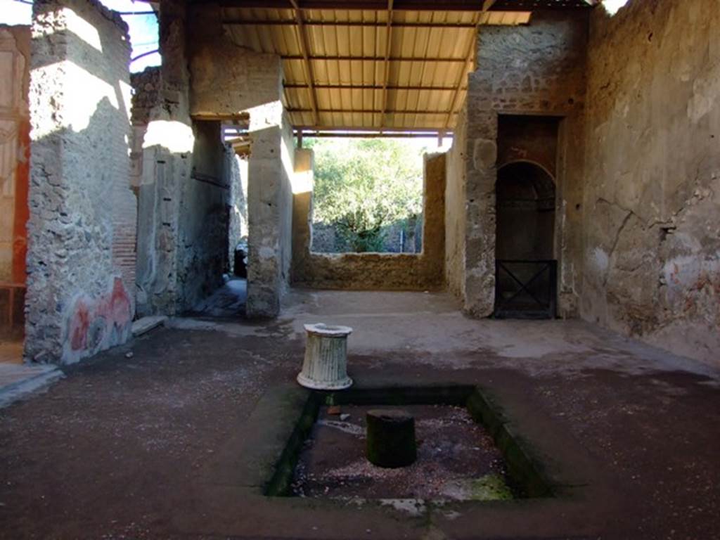 I.6.4 Pompeii. September 2019. Room 1, looking south across impluvium in atrium.
Photo courtesy of Klaus Heese.

