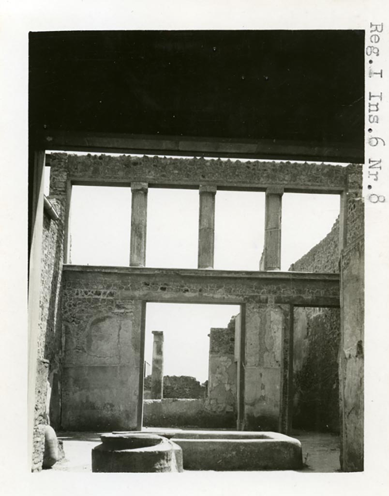 I.6.8/9 Pompeii. Pre-1937-39. Looking south across atrium towards tablinum.
Photo courtesy of American Academy in Rome, Photographic Archive. Warsher collection no. 1853.
