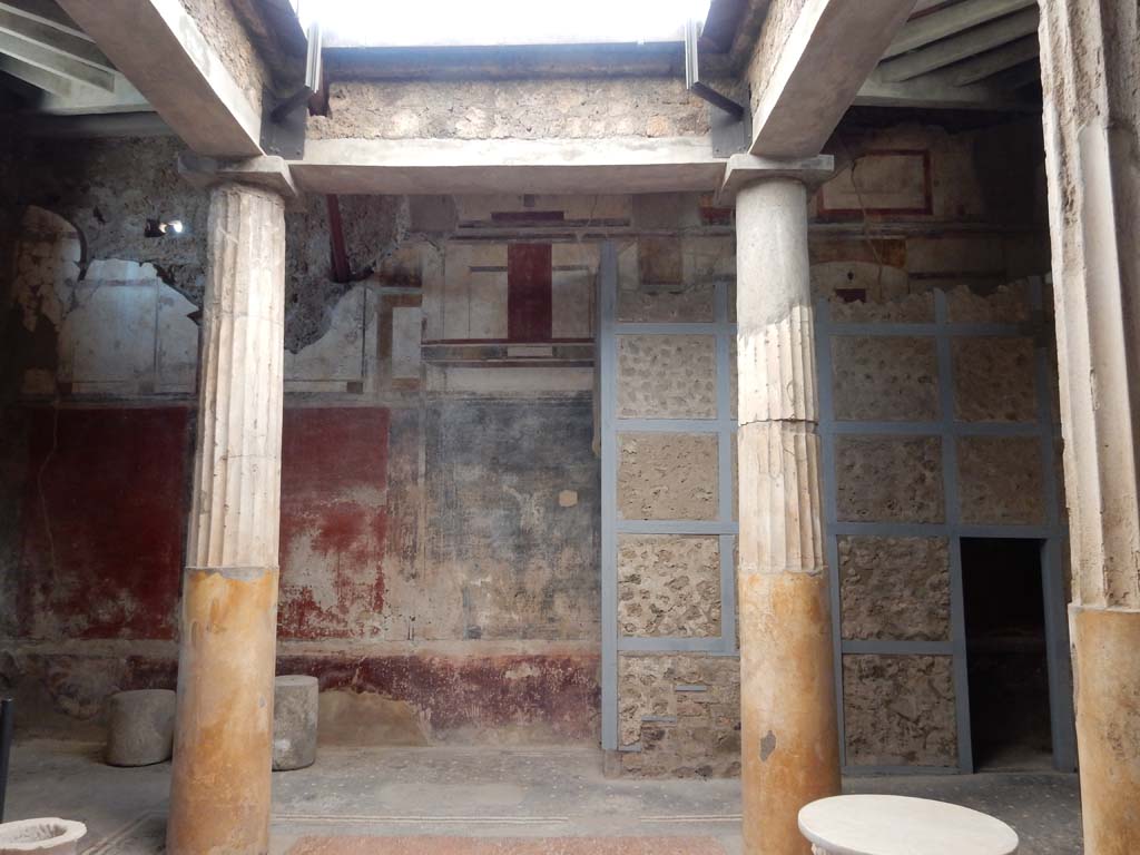 I.6.15 Pompeii. June 2019. Room 4, looking towards upper west wall and compluvium above atrium. 
Photo courtesy of Buzz Ferebee.


