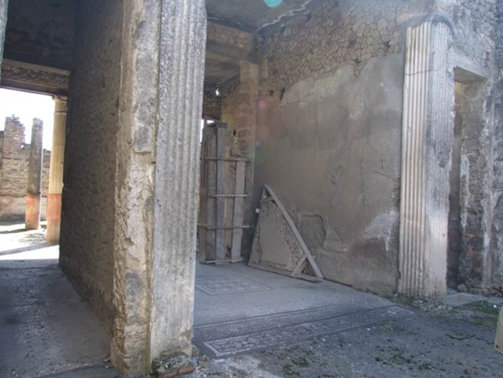 I.9.5 Pompeii. March 2009. Room 7 Corridor to rear of house, and room 8 Tablinum.