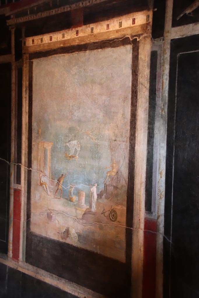 I.9.5 Pompeii. October 2022. 
Room 10, central painting of Daedalus and Icarus, from east wall. Photo courtesy of Klaus Heese.
