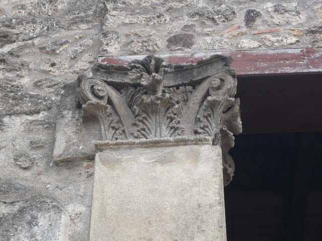 I.10.4 Pompeii. May 2010. North-west corner of atrium, front of the aedicula lararium, looking north.