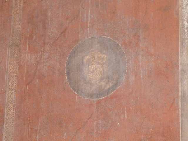 I.10.4 Pompeii. May 2010. North wall in north-east corner of atrium. Panel with painted theatrical masks.