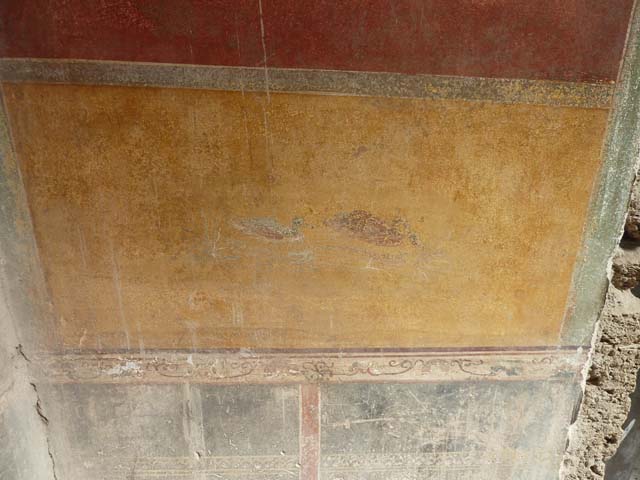 I.10.4 Pompeii. May 2010. North-east corner of atrium and east wall, including east wall of entrance corridor, and doorways to rooms 1,3 and 4.