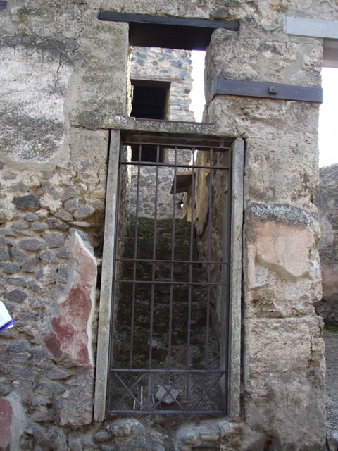 I.10.5 Pompeii. December 2007. Niche on west wall of site of stairs to upper floor.