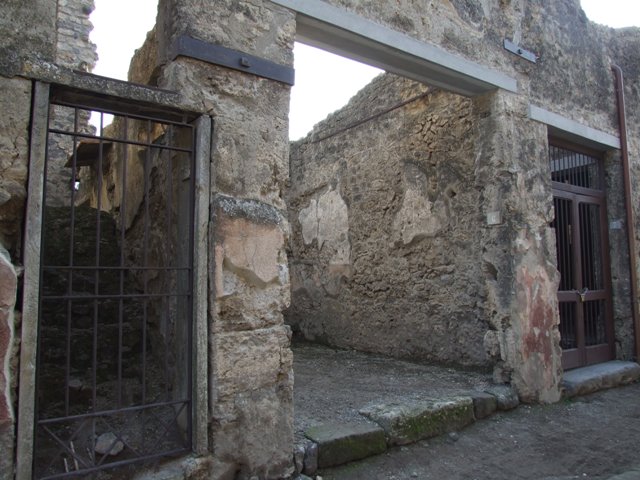 I.10.6 Pompeii. December 2007. West wall with niche in small room to east of workshop.  
