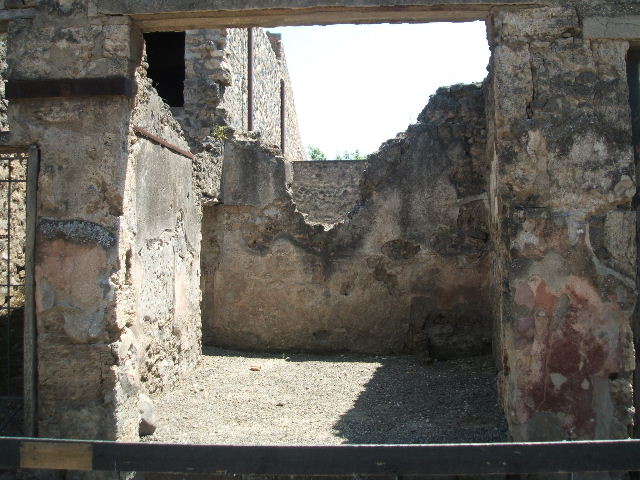 I.10.6 Pompeii.  Workshop.   December 2007. Small room to east of workshop.  Hearth or oven in west wall.