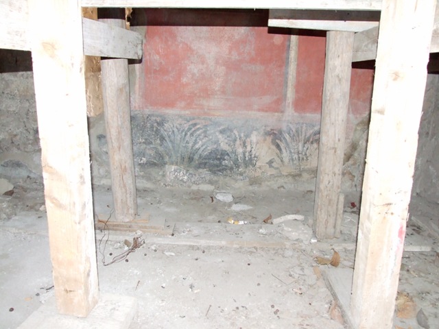 I.10.7 Pompeii. March 2009. Room 5.  Cubiculum. Remains of painting of flying figure.