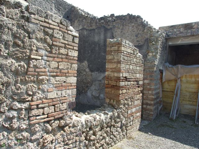 I.10.8 Pompeii. March 2009. Room 3, west wall of cubiculum, with remains of painting.