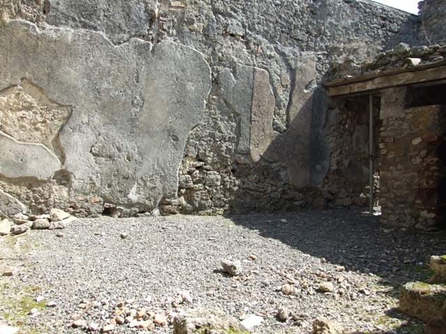 I.10.8 Pompeii. March 2009. Room 5, recess or blocked door in north-east corner of the yard.
