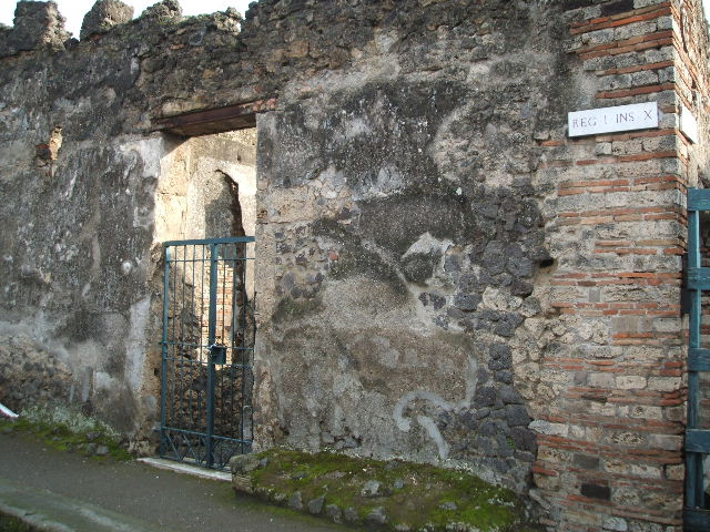 I.10.8 Pompeii. March 2009. Looking south along entrance corridor to Room 1. Atrium.