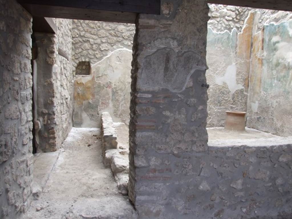 I.11.6 Pompeii. March 2009. Room 5, south wall of tablinum with window overlooking garden, and door to corridor.