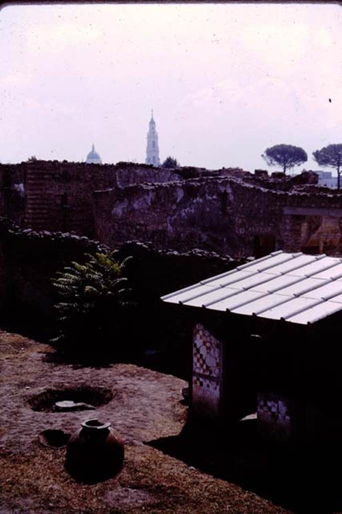 I.11.10 Pompeii. 1964. Looking south-east to small room against south wall.  Photo by Stanley A. Jashemski.
Source: The Wilhelmina and Stanley A. Jashemski archive in the University of Maryland Library, Special Collections (See collection page) and made available under the Creative Commons Attribution-Non Commercial License v.4. See Licence and use details.
J64f1904
