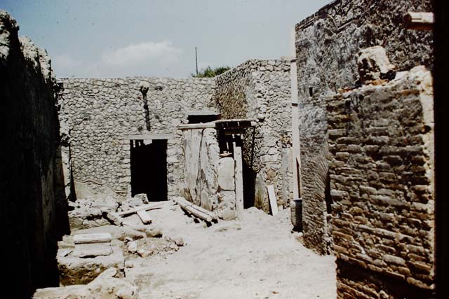 I.12.2 and I.12.1 Pompeii.  March 2009.  Room 13. Bread making room. Looking south.