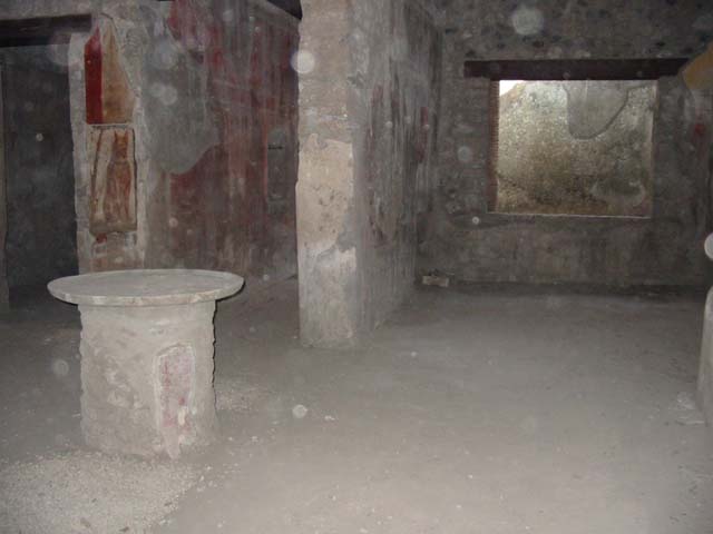 I.12.3 Pompeii.  March 2009.  Looking east from north passageway, to doorways of rooms 4 and 5.