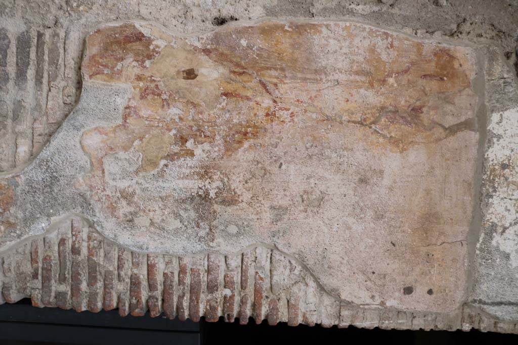 I.12.3 Pompeii. December 2006. Room 1. Caupona. Portrait of dog on pillar.