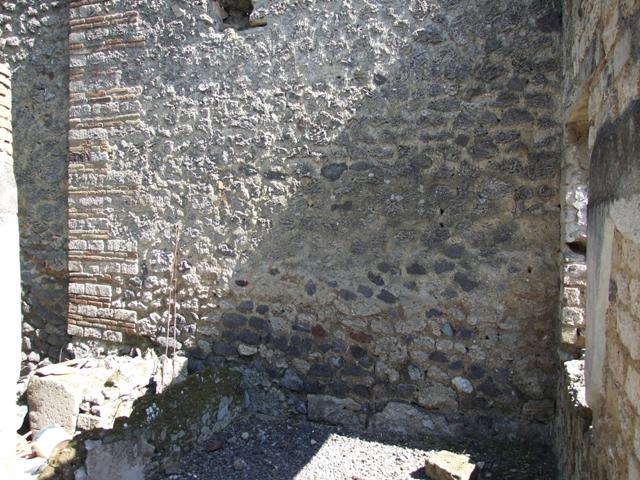 I.12.8 Pompeii. March 2009. East wall of room 5, with small doorway into room 7.
This doorway is not shown on the Eschebach 1969 plan.

