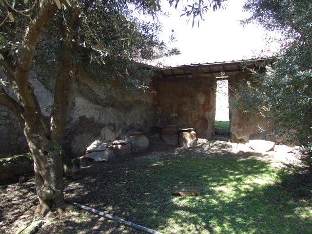 I.12.8 Pompeii.  March 2009.   Room 7.  Looking east to room 8. 